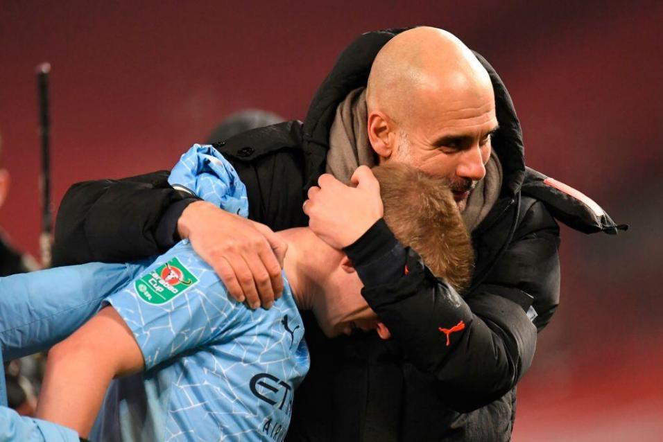 Kevin de Bruyne y Pep Guardiola