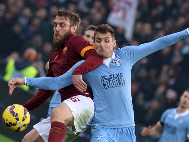 Daniele De Rossi and Miroslav Klose will face off in one of the most important Rome derbies for years