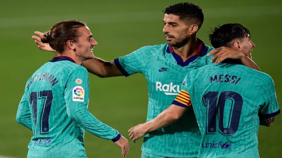 Barcelona's Antoine Griezmann, Luís Suarez and Lionel Messi