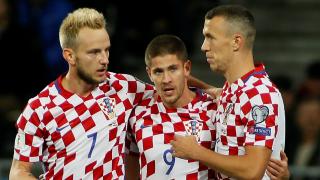Croatia and Barcelona midfielder Ivan Rakitic (L)