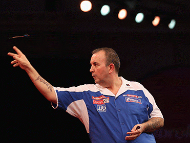 Concentration . . . Phil Taylor says darts is his escapism