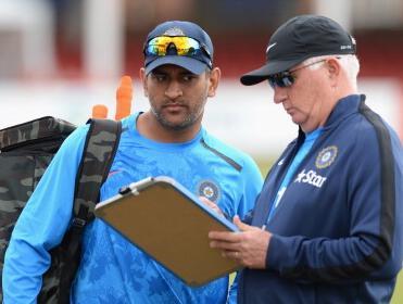 Dhoni and coach Duncan Fletcher have been unable to reverse India's awful away run