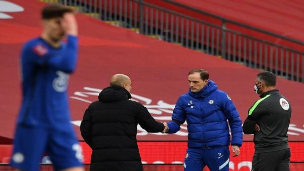 Guardiola and Tuchel shake hands.jpg