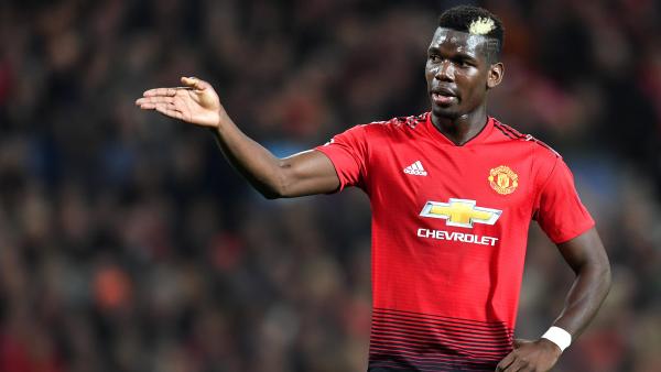 Paul Pogba hand on hip arm outstretched 1280.jpg
