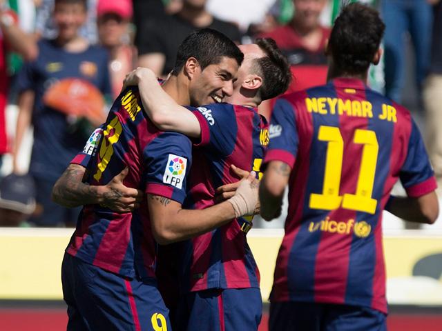 Luis Suarez, Lionel Messi and Neymar have fired Barcelona to within a game of the treble