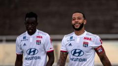 Lyon strikers Memphis Depay and Tino Kadewere