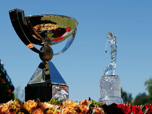 Who will capture the FedEx Cup and Tour Championship trophies?