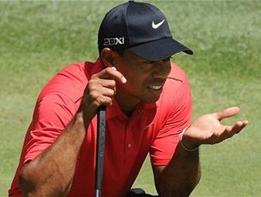 Tiger needed a birdie at 18 to earn the right to play the weekend