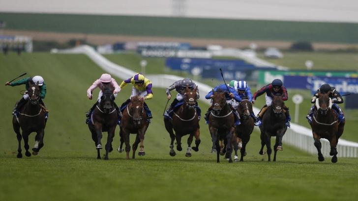Horse racing action at Newmarket