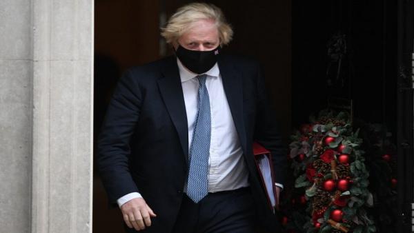 Boris Johnson leaves Downing St in mask.jpg