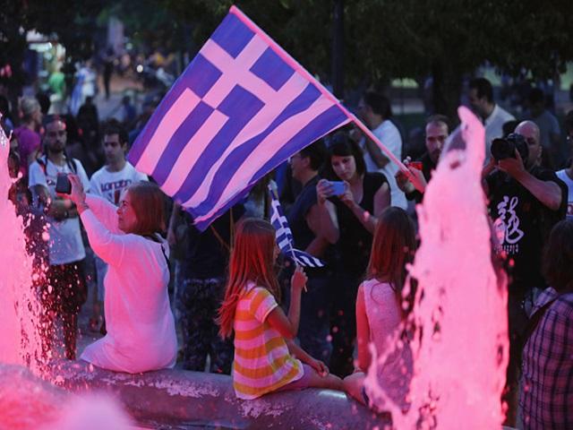 Oxi supporters celebrate outside the Greek parliament