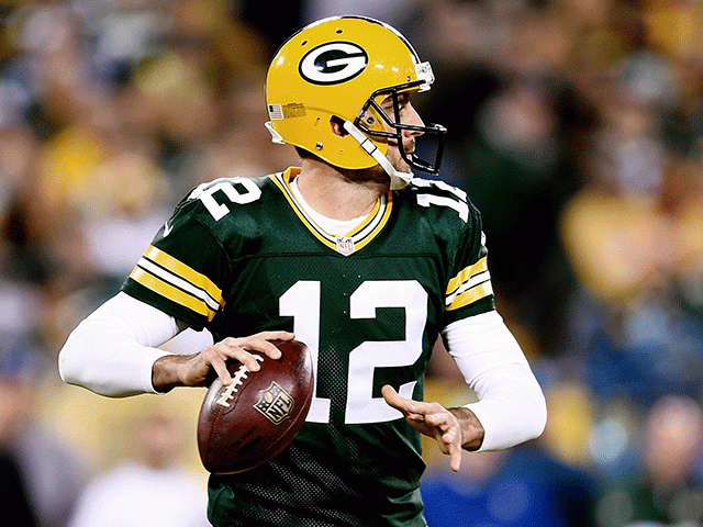 Strong arm of the law: Aaron Rodgers is clicking with his wide men at the right time