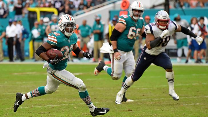 Miami Dolphins in action against New England
