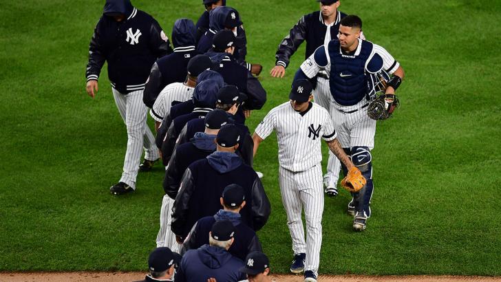 New York Yankees players congratulate each other